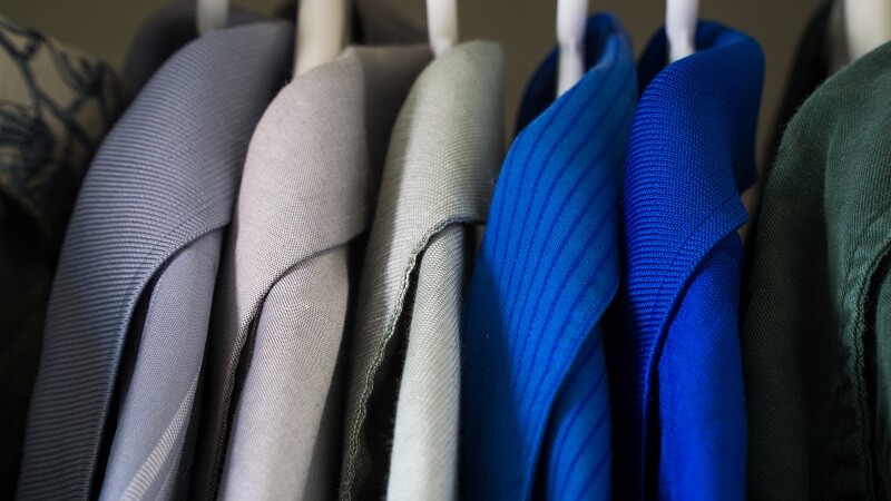 Hanging coats in a wardrobe