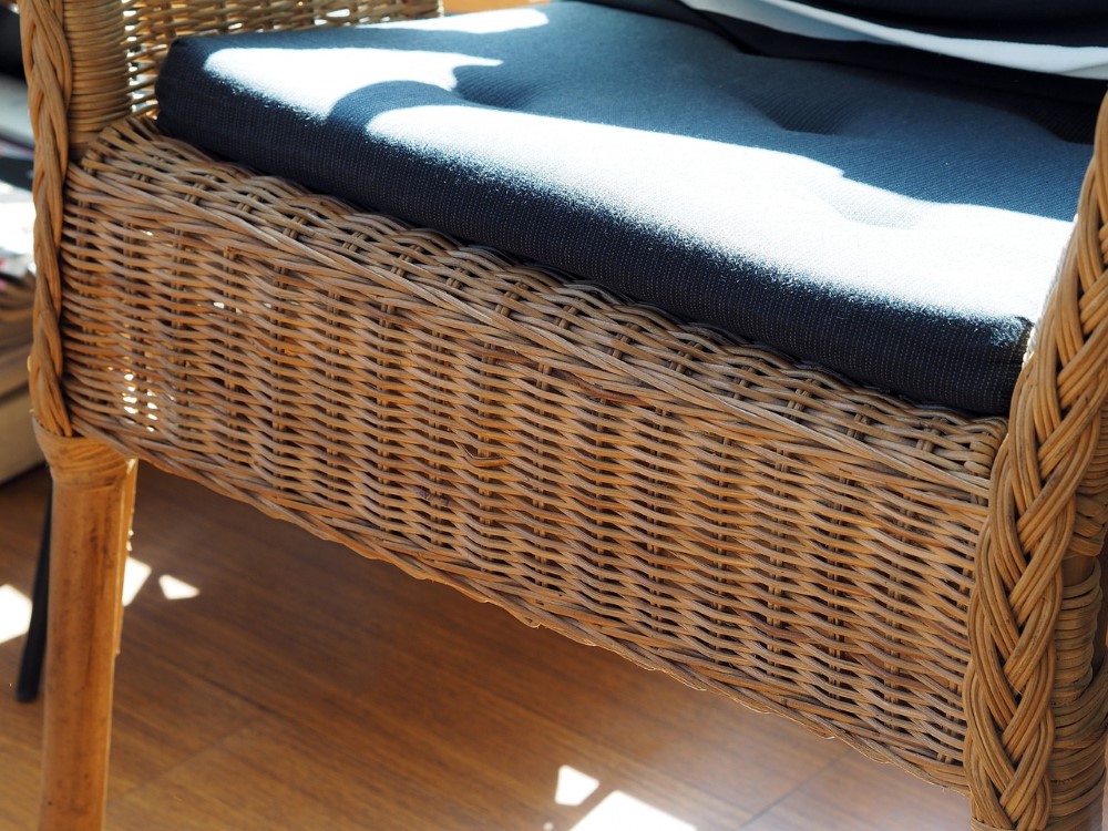 a closeup of a chair made from rattan