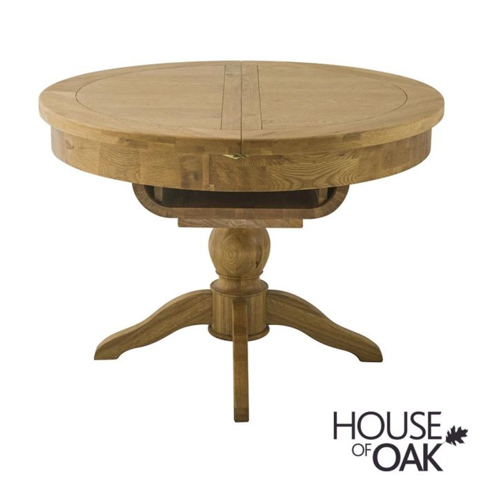Portman Round Extending Table In Oak By, Round Oak Tables Pedestal